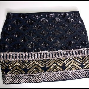 Black and gold mini skirt
